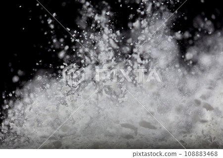 Tapioca starch flour fly explosion, White powder tapioca starch fall down in air. Seasoning flour powder is element material. Eyeshadow crush make up. Black background Isolated selective focus blur Tapioca starch flour fly explosion, White powder tapioca starch fall down in air. Seasoning flour powder is element material. Eyeshadow crush make up. Black background Isolated selective focus blur 108883468