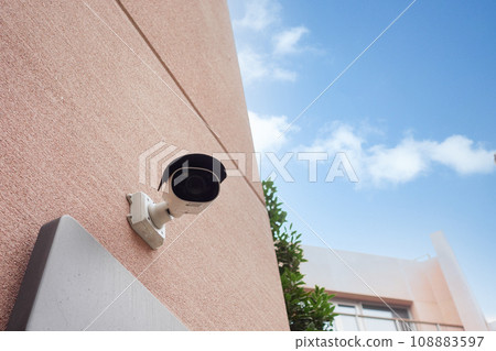 CCTV security camera operating outdoor  108883597