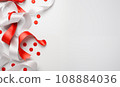 Top View Red And White Ribbon, Red Polka Dot With Empty Copy Space Isolated On A White Gray Background. Design Of Mockup For New Year Or Christmas Holidays, Birthday 108884036