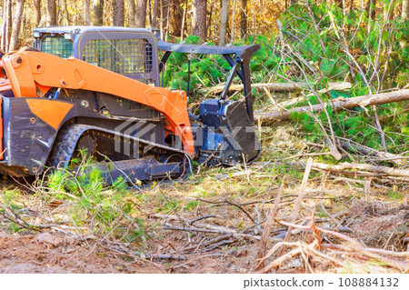 During forest clearing contractor used tracked general purpose forestry mulcher 108884132