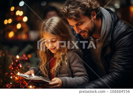dad and daughter at the Christmas market.  108884556