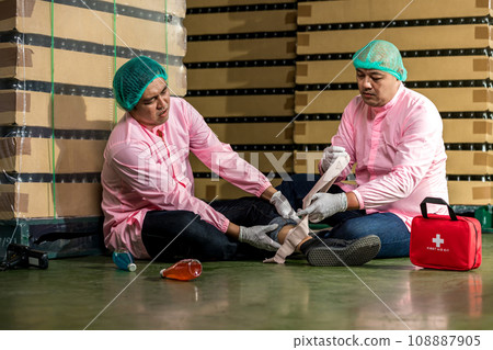 First aid support accident at work of worker at factory.  108887905