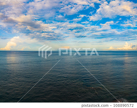 Amazing sunset or sunrise sky over sea landscape,Beautiful colorful light of nature seascape background,Drone aerial view ocean background Amazing sunset or sunrise sky over sea landscape,Beautiful colorful light of nature seascape background,Drone aerial view ocean background 108890572