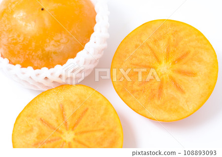 White background material of cut Fuyu persimmons White background material of cut Fuyu persimmons 108893093