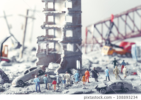 A diorama of a city destroyed by disaster or war and people wandering around. 108893234