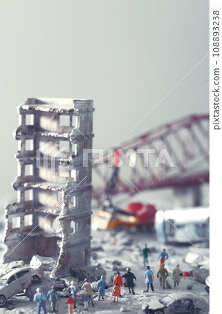 A diorama of a city destroyed by disaster or war and people wandering around. 108893238