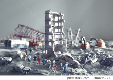 A diorama of a city destroyed by disaster or war and people wandering around. 108893275