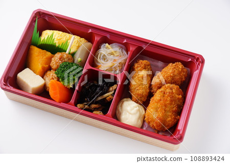 Japanese lunch box - boiled vegetables and fried oysters Japanese lunch box - boiled vegetables and fried oysters 108893424