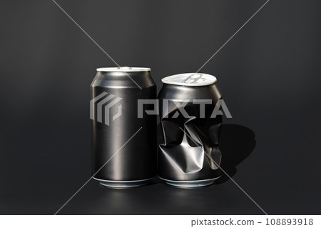 Two used aluminum beverage cans. Black soda can mock up. Two used aluminum beverage cans. Black soda can mock up. 108893918