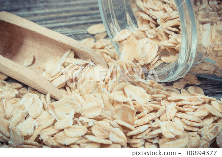 Healthy rye flakes or oat bran as source dietary fiber and minerals. Nutritious eating Healthy rye flakes or oat bran as source dietary fiber and minerals. Nutritious eating 108894377
