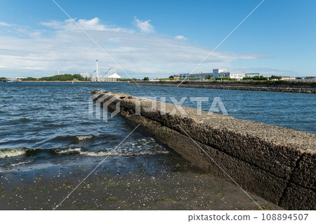 Breakwater with a view of the amusement park Breakwater with a view of the amusement park 108894507