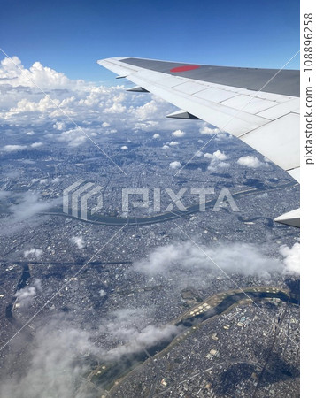Tokyo seen from the window of a passenger plane Tokyo seen from the window of a passenger plane 108896258