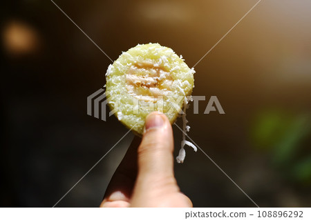 Thai sweet Dessert, Banana in steamed Sticky Rice pieces on white Foam box Thai sweet Dessert, Banana in steamed Sticky Rice pieces on white Foam box 108896292