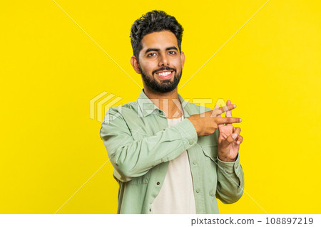 Indian young man showing hashtag symbol with fingers popular viral social media internet content 108897219