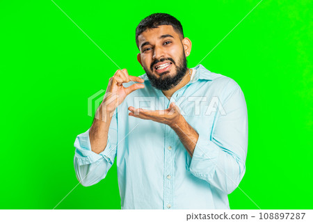 Man show a little bit gesture, begging help, need some more, please give me measuring small size Man show a little bit gesture, begging help, need some more, please give me measuring small size 108897287