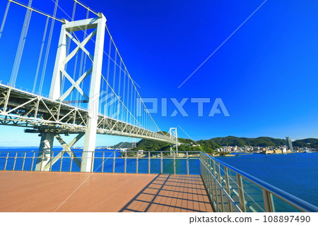 Kanmon Bridge (Kanmon Strait) on a clear day seen from Dannoura PA 108897490