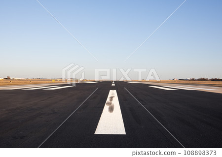 Surface and marking of long airport runway Surface and marking of long airport runway 108898373