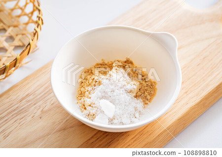 Soybean flour, sugar and salt in a bowl Soybean flour, sugar and salt in a bowl 108898810