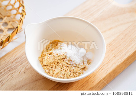 Soybean flour, sugar and salt in a bowl Soybean flour, sugar and salt in a bowl 108898811