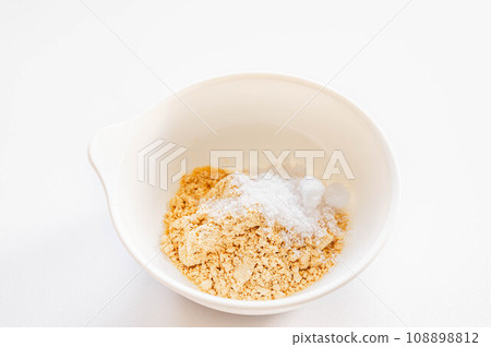 Soybean flour, sugar and salt in a bowl Soybean flour, sugar and salt in a bowl 108898812