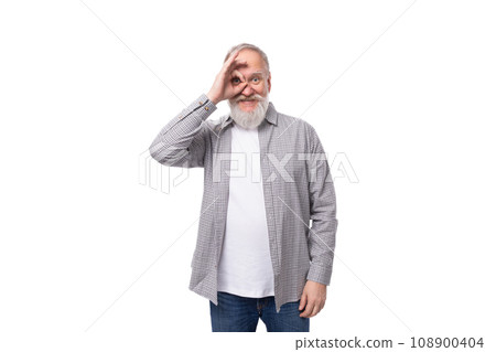 charming stylish mature man with white beard and mustache dressed in casual comfortable shirt 108900404