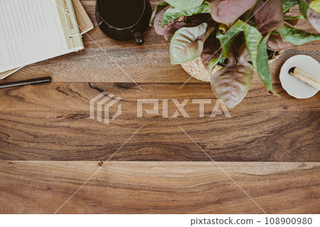 Wood desk office copy space with stationery and notepads flat lay 108900980