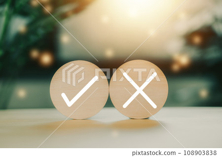 Wood block circle with correct or wrong icon. Yes or no symbol. Accept or reject. Wood block circle with correct or wrong icon. Yes or no symbol. Accept or reject. 108903838
