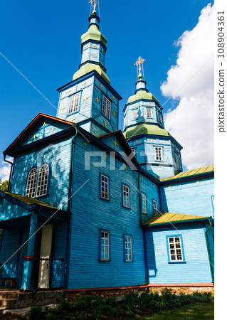 Old wooden church in in Open air Museum of Folk Architecture and Folkways of Middle Naddnipryanschina in Pereyaslav, Ukraine 108904361