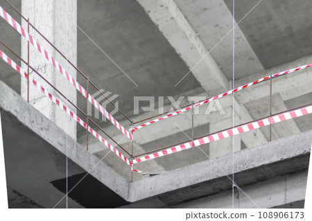 Red and White Lines of barrier tape, staircase fencing at a construction site 108906173