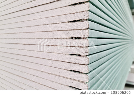 Drywall stacked in stacks at a hardware store, close up 108906205