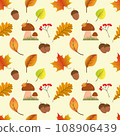 Autumn seamless pattern with falling leaves of a maple, oak birch, rowan berries,edible mushrooms, acorns. 108906439