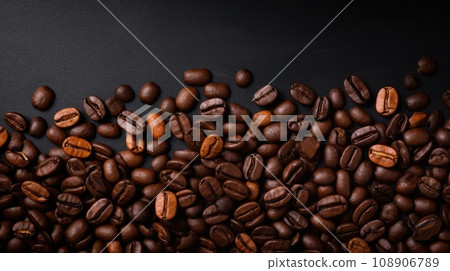 Coffee beans on dark background, top view 108906789