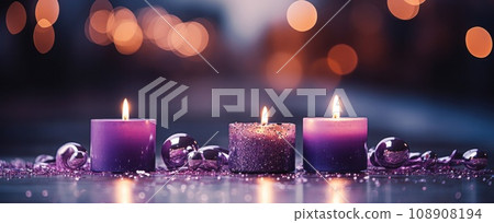 lit candles on a dark background with bokeh glow lit candles on a dark background with bokeh glow 108908194