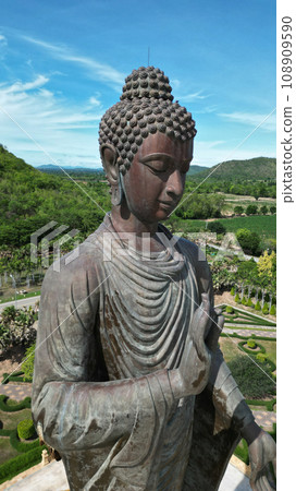 Wat Thipsukontharam temple houses the Buddha Maha Metta Prachathai Trilokanath Khanthararat Anusorn. Buddha statue asking for rain Made of bronze, 32 meters high, standing on an 8 meter high base. Wat Thipsukontharam temple houses the Buddha Maha Metta Prachathai Trilokanath Khanthararat Anusorn. Buddha statue asking for rain Made of bronze, 32 meters high, standing on an 8 meter high base. 108909590