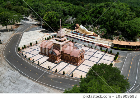 Sandstone castle and large outdoor reclining Buddha at Tham Phu Wa Temple It is a Thai art form. It is reddish brown. It has a beautiful. Located at Kanchanaburi Province in Thailand. Sandstone castle and large outdoor reclining Buddha at Tham Phu Wa Temple It is a Thai art form. It is reddish brown. It has a beautiful. Located at Kanchanaburi Province in Thailand. 108909698