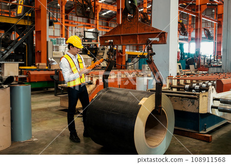 Machine operator skillfully operate steel forming machinery. Exemplifying Machine operator skillfully operate steel forming machinery. Exemplifying 108911568
