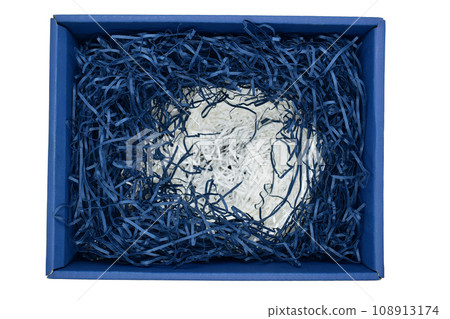 blue and white paper filler in carton cardboard box isolated on white background blue and white paper filler in carton cardboard box isolated on white background 108913174