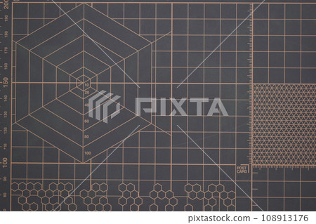 closeup brown cutting mat, equipment in office closeup brown cutting mat, equipment in office 108913176