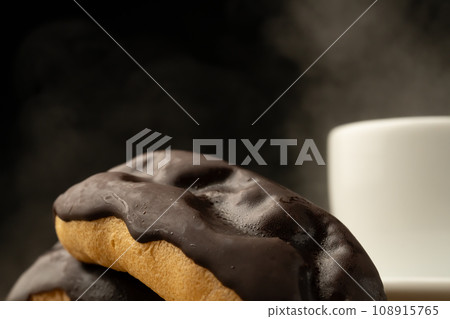 Eclairs and coffee Eclairs and coffee 108915765