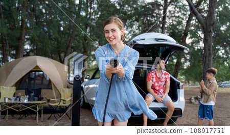 Outdoor adventure and family vacation camping at sea travel. Perpetual 108917751