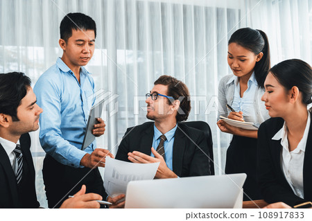 Diverse of business people discuss business. Meticulous 108917833