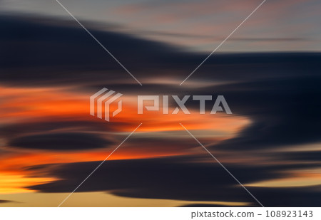 Vibrant Long Exposure of Dusk Sky with Multicolored Clouds 108923143