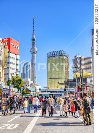 Tokyo's urban landscape, Asakusa, a pedestrian zone for the first three days of the New Year Tokyo's urban landscape, Asakusa, a pedestrian zone for the first three days of the New Year 108923237