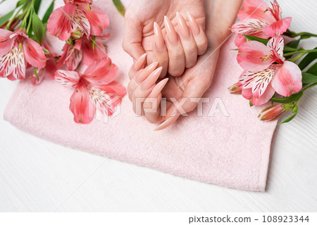 Elegant pastel pink natural manicure. Elegant pastel pink natural manicure. 108923344