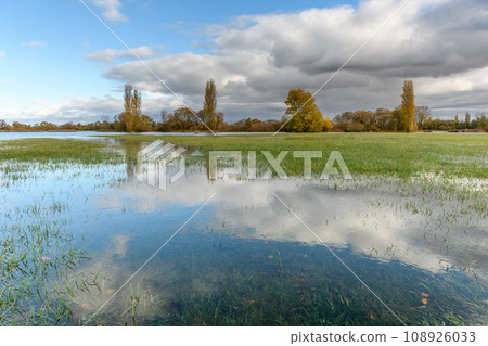 Flooded meadow after heavy rains. Autumn landscape. Flooded meadow after heavy rains. Autumn landscape. 108926033