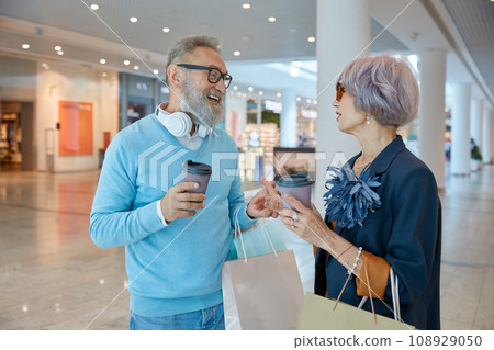 Retired people spending time in city shopping center 108929050
