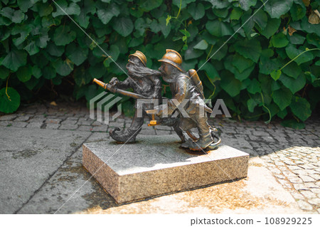 Wroclaw Dwarf. The small figurines in the streets of Wroclaw old town. Hunting for dwarfs, tourist attraction 108929225