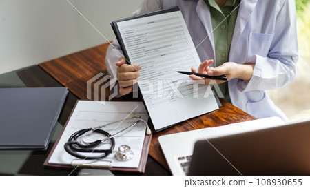 Female doctor explain examination results and counseling about treatment with patient on video call Female doctor explain examination results and counseling about treatment with patient on video call 108930655