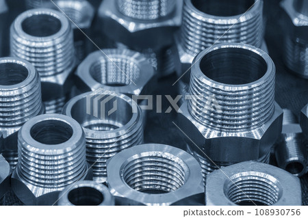 Close up scene the set of pipe connector parts in the light blue scene. Close up scene the set of pipe connector parts in the light blue scene. 108930756