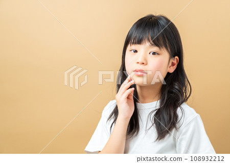 A girl staring. 108932212